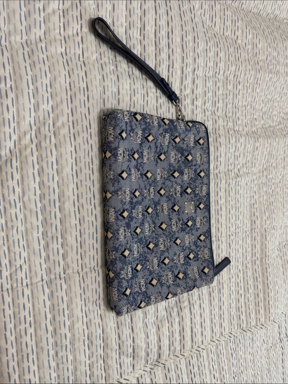 MCM Navy Monogram Wristlet Clutch with Cream Accents